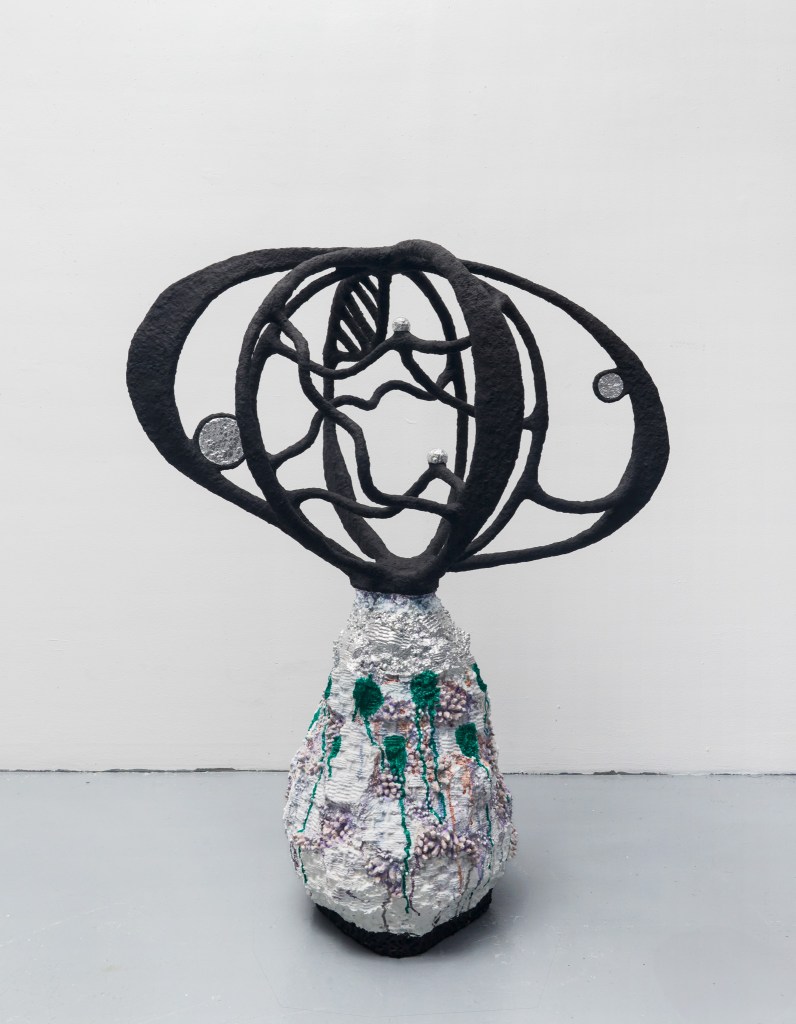 The universe is balancing on a mountain top, 2025, Acrylic and aluminum leaf on modeling compound, aluminum, and styrofoam, 44 x 36 x 26 inches